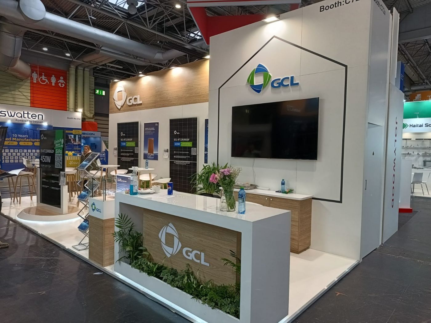 GCL trade show stand with reception desk and integrated AV